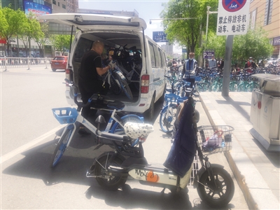 回民区整治校园周边共享单车乱停乱放