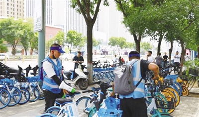呼和浩特城管部门管理共享单车出新招